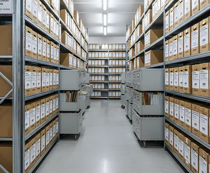 Document storage unit with barcoded files and neatly organized boxes for secure storage